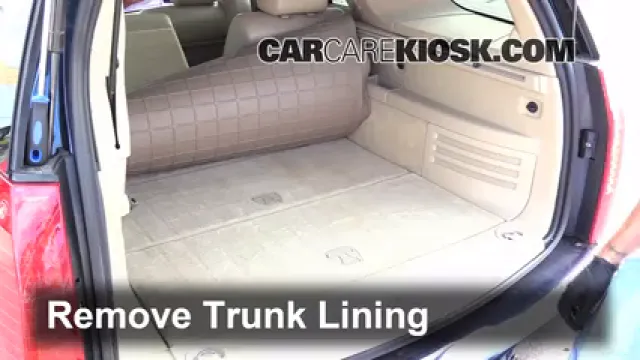 2007 Cadillac SRX 4.6L V8 Levantar auto Usar el gato para levantar el auto